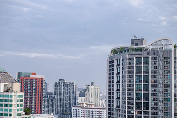 Fototapeta na wymiar Sky view of city buildings with blue sky at Bangkok Thailand 