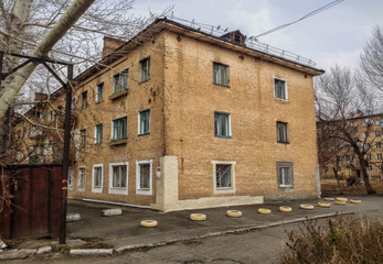 Very old residential building on one of the streets of the old town. Old neighborhood