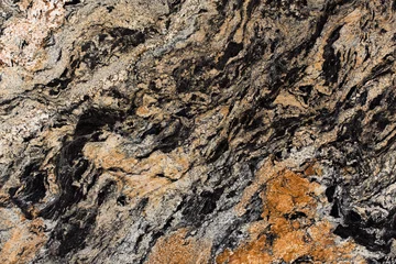 Wandaufkleber Granite texture, black and brown color, precious stone. © Dmytro Synelnychenko