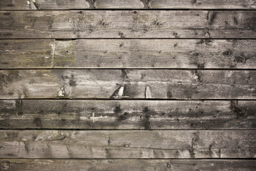 Old weathered planks on old house detail