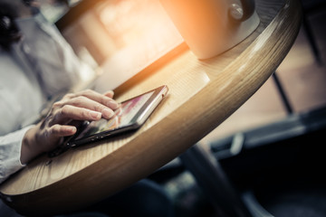 business concept with business woman working with business graph and laptop and smartphone on woooden table top