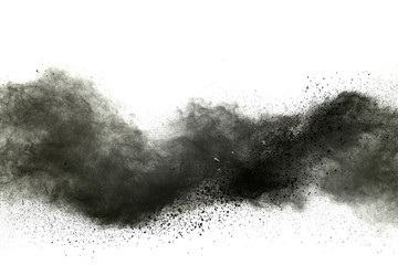 Freeze motion of black powder explosions isolated on white background
