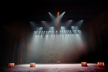 theatrical stage with curtain and lights with blue light