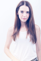 Fototapeta premium Beautiful young happy caucasian woman playing with healthy long hairs fashion beauty concept