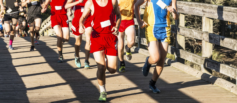 High School Boys Racing Over The Bridge At Sunken Meadow State Park