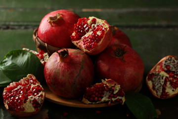 Juicy pomegranates on plate