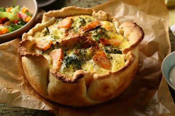 Tasty quiche pie with fish and vegetables