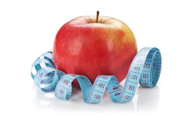 blue measure tape and red apple  isolated