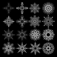 Set of flower mandalas in black and white. Hand drawn sacred geometry mandala background. Seed of life symbols. Vector.