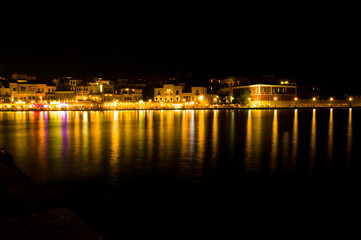 light in the sea of chania by night