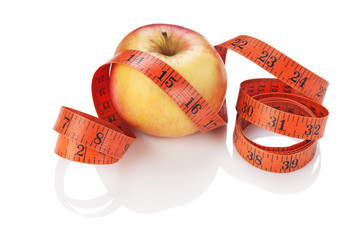 measure tape and apple isolated