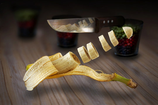 levitating sliced banana with knife