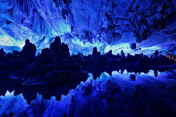 Reed Flute Cave at Guilin, Gunagxi, China. The Reed Flute Cave, also known as the Palace of Natural Arts, is a landmark and tourist attraction in Guilin, Guangxi, China © jayyuan