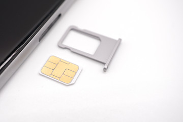 nano sim, sim tray and smartphone part of telecommunication.