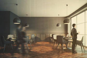 Fototapeta na wymiar Gray cafe interior, gray chairs toned