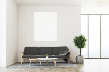 White living room, sofa, poster