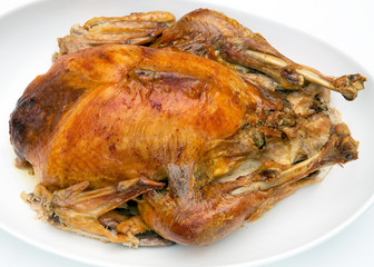 golden brown turkey roast isolated on white