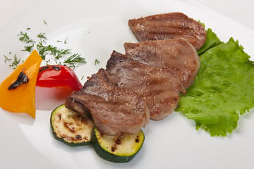 dishes of roast meat