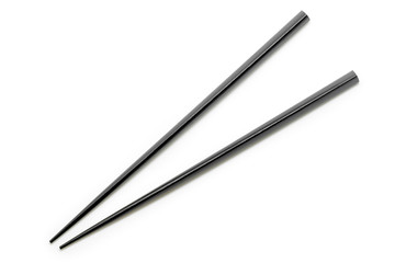Black Wooden Chopsticks isolated on white background. Asian Food Chopsticks