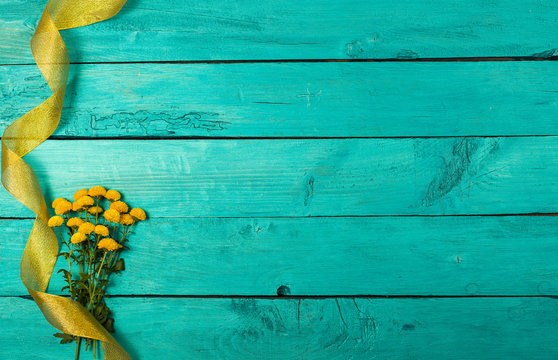 Yellow flowers on a blue background