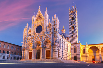 Beautiful view of facade and campanile of Siena Cathedral, Duomo di Siena at sunrise, Siena, Tuscany, Italy - obrazy, fototapety, plakaty