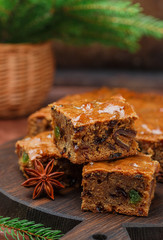 Fruitcake with raisins, dates, candied citrus, honey, cinnamon, anise and cardamom. Homemade Christmas dessert.  New year. Selective focus