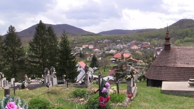 Old cemetery in the mountain village in Eastern Europe