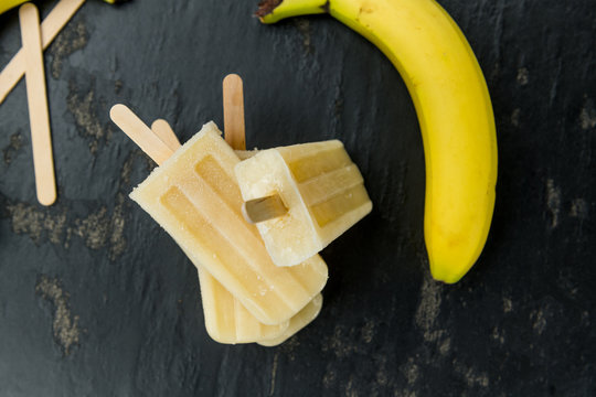 Banana Popsicles on a slate slab