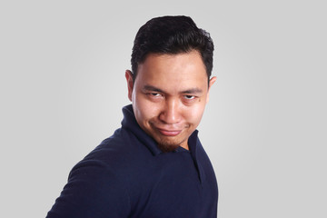 Fototapeta premium Funny Asian Man Smiling