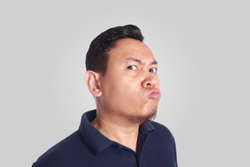 Obraz premium Synical Asian Man Expression