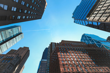 Fototapeta na wymiar Looking up Lower Manhattan skyscrapers, New York City