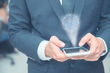 Handsome man in suit connect to the world of branch of campany,Earth