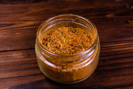 Mix of different seasonings in glass jar