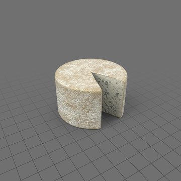 Sliced wheel of blue cheese