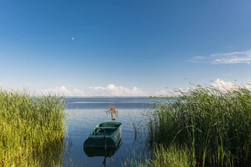 Wandcirkels aluminium Boat on the lake Nero in Rostov © Morgenstjerne