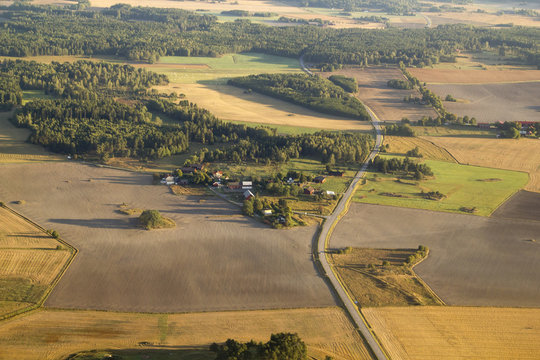 Aerial view of green rural landscape and houses in Sweeden