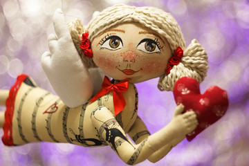 Obraz na płótnie Canvas Hand sewing doll, angel, princess.