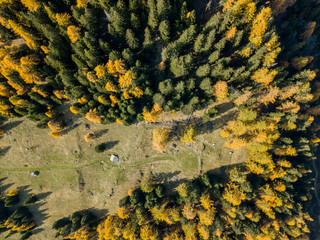 Aerial view of cottage in Swiss mountains in fall season