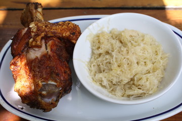 stinco di maiale con crauti, pork knuckle with sauerkraut 