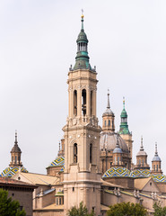 Fototapeta na wymiar The Cathedral-Basilica of Our Lady of Pillar - a roman catholic church, Zaragoza, Spain. Copy space for text. Vertical.