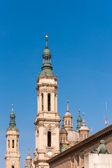Fototapeta na wymiar The Cathedral-Basilica of Our Lady of Pillar - a roman catholic church, Zaragoza, Spain. Copy space for text. Vertical.