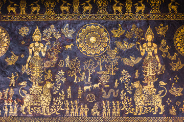 Ornamental drawing on the facade of a building in Louangphabang, Laos. Close-up.