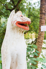 Statue of a Buddhist god, Louangphabang, Laos. Close-up. Vertical.
