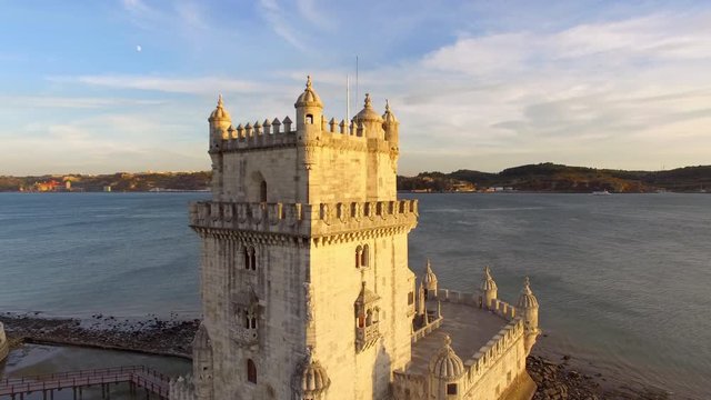 Lisbon, Portugal, aerial view of Belem Tower (Torre de Belem) by the Tagus river at sunset.