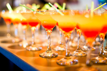 Glasses with alcoholic cocktails