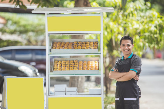 small business owner and his food stall