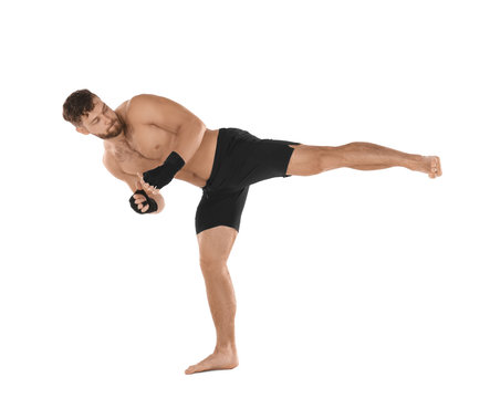Male kickboxer on white background