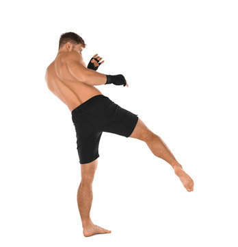 Male kickboxer on white background
