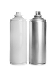 Spray cans with paint, isolated on white