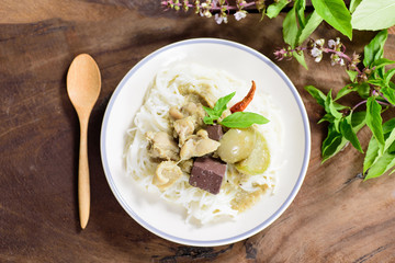 Thai food, rice vermicelli noodles with green curry chicken